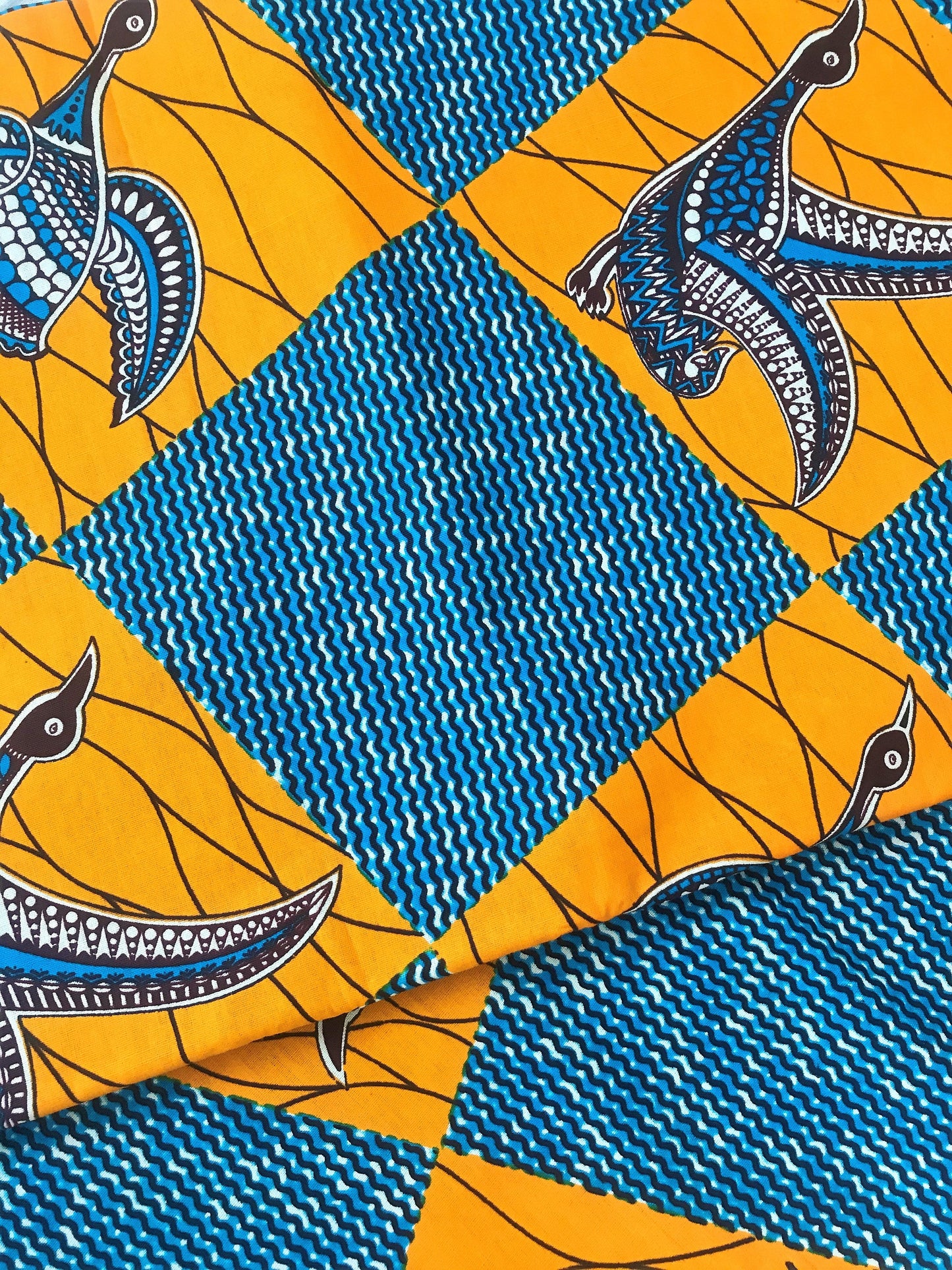 REINVENTED CLASSIC FLYING SWAN PATTERNED AFRICAN WAX BLOCK PRINT FABRIC - PER METER